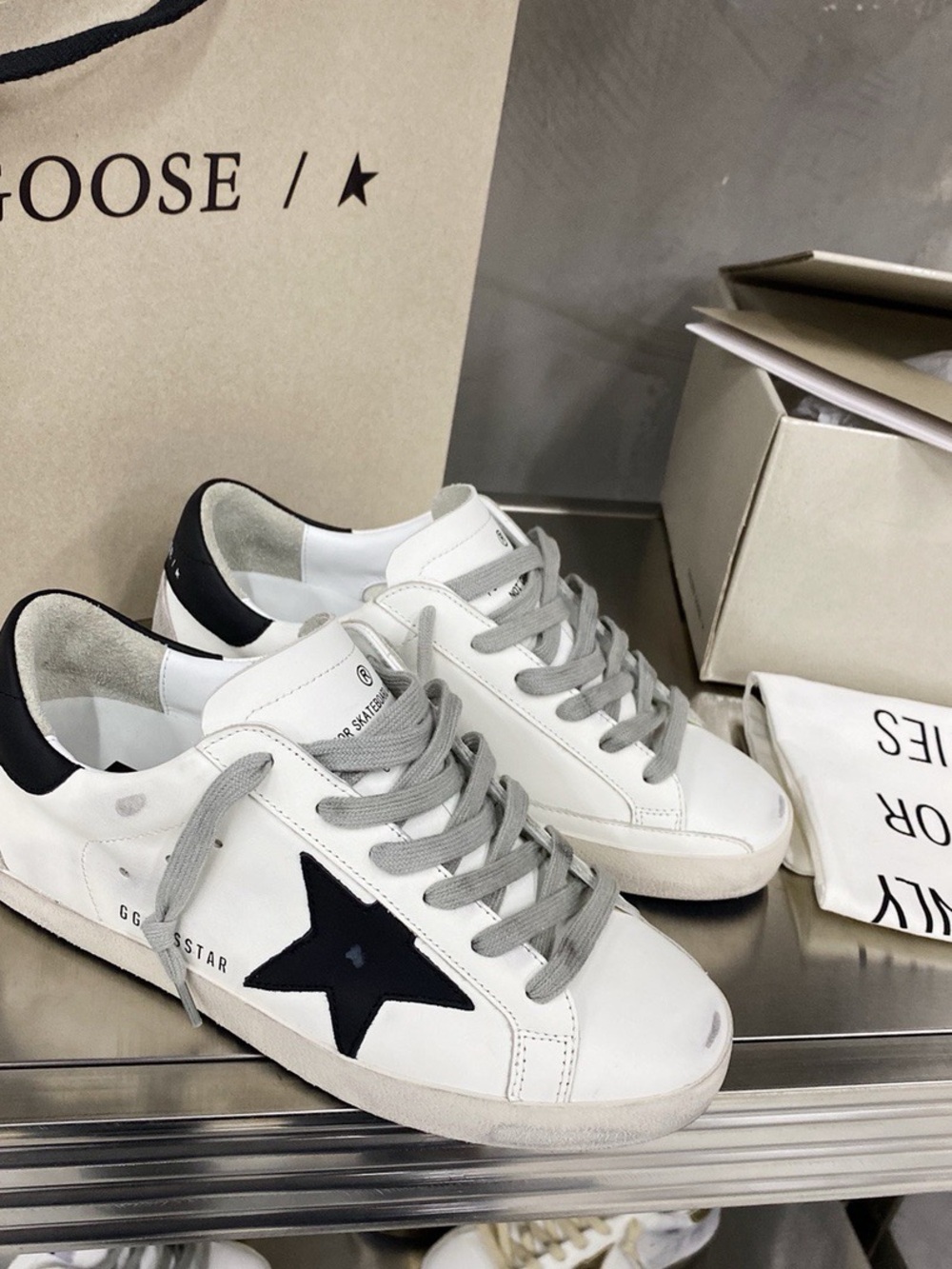 Golden Goose White Leather Low-Top Sneakers with Black Star and Heel
